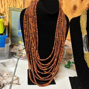 Gerda Lynggard Monies 11 strand amber horn/horn necklace.